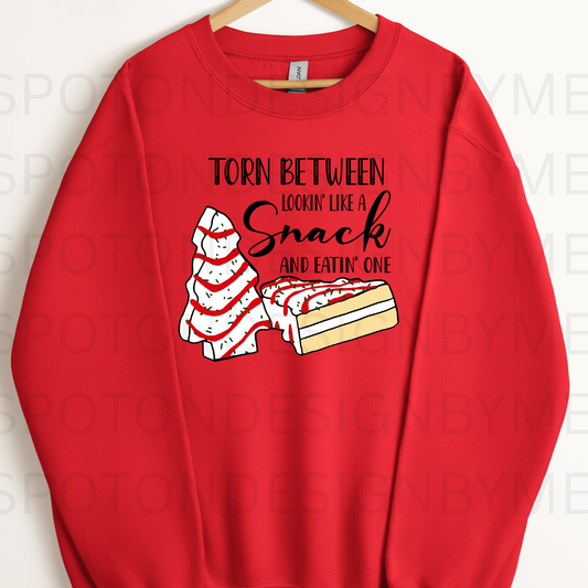 Torn Between Looking Like A Snack Christmas Tee Cake Crewneck